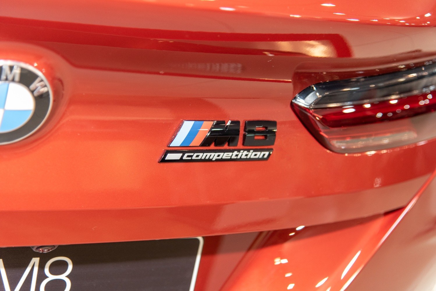 Close-up of M8 Competition rear badge and tail light detail