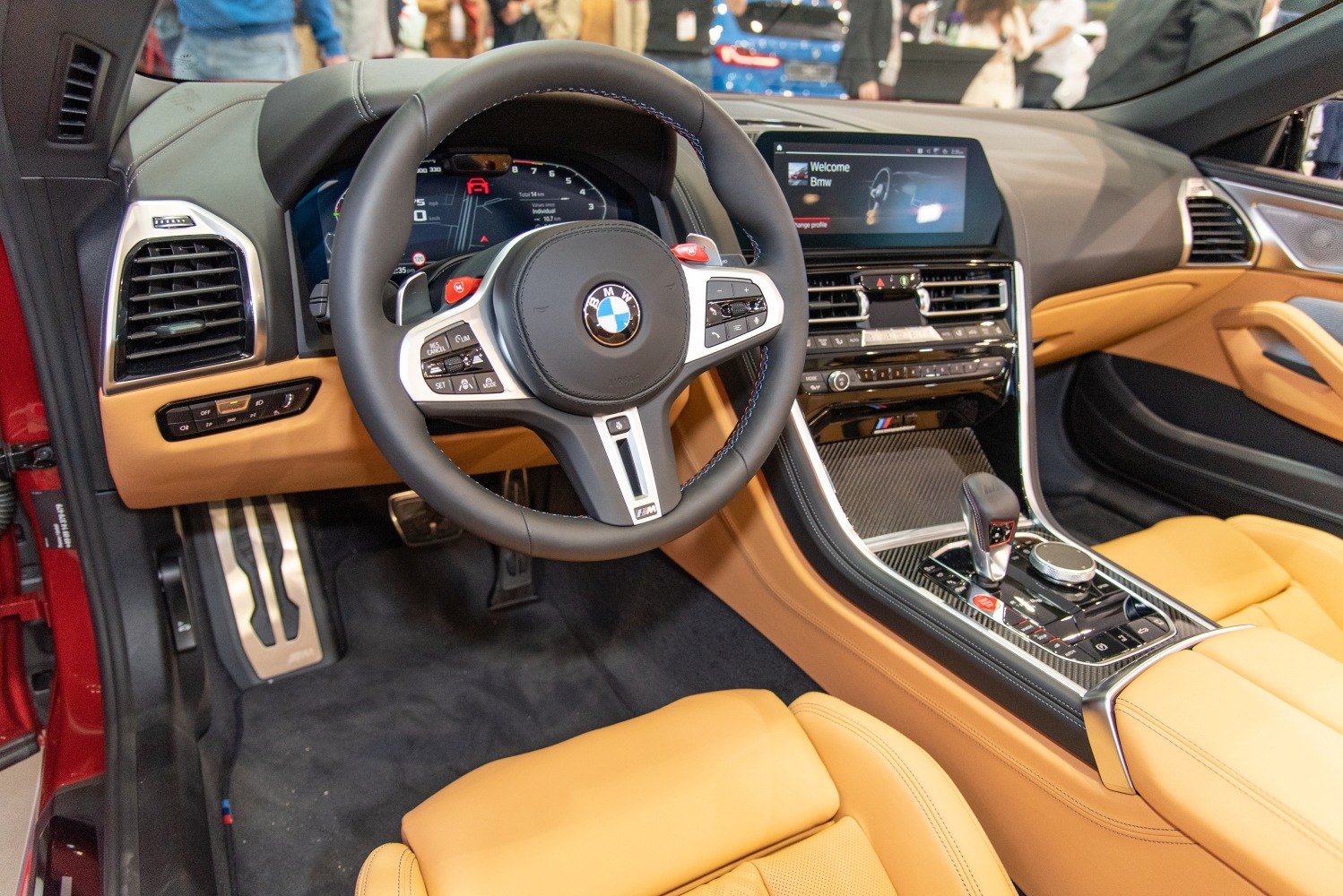 Steering wheel, dashboard, center console with leather seats and digital displays