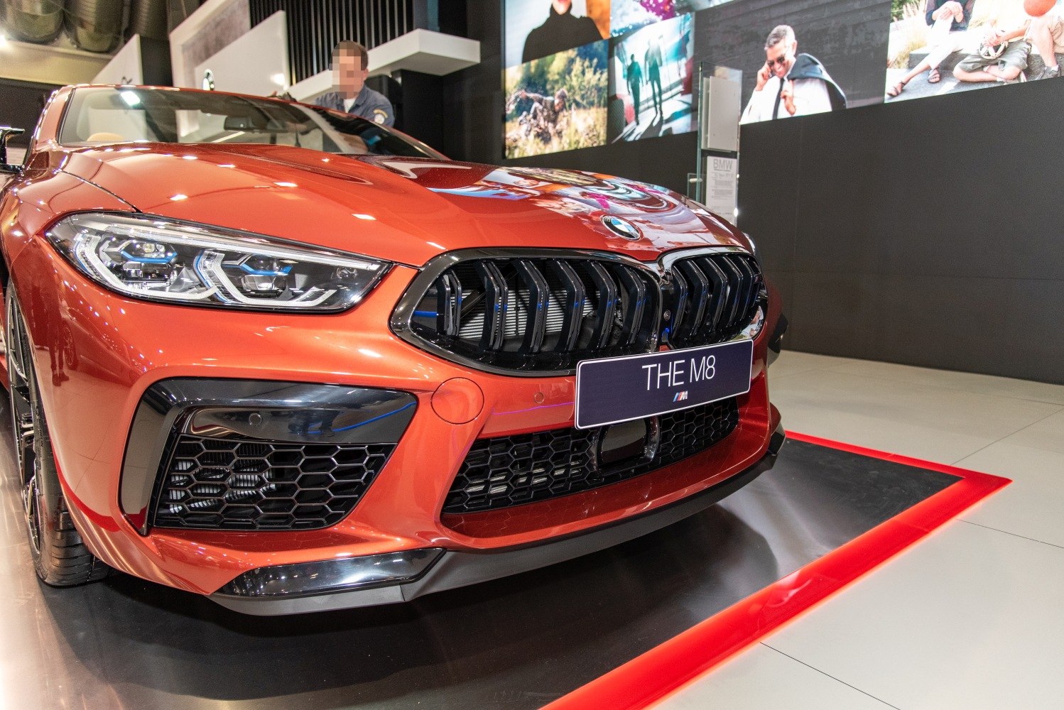 Aggressive front grille and modern headlight design on a sporty convertible
