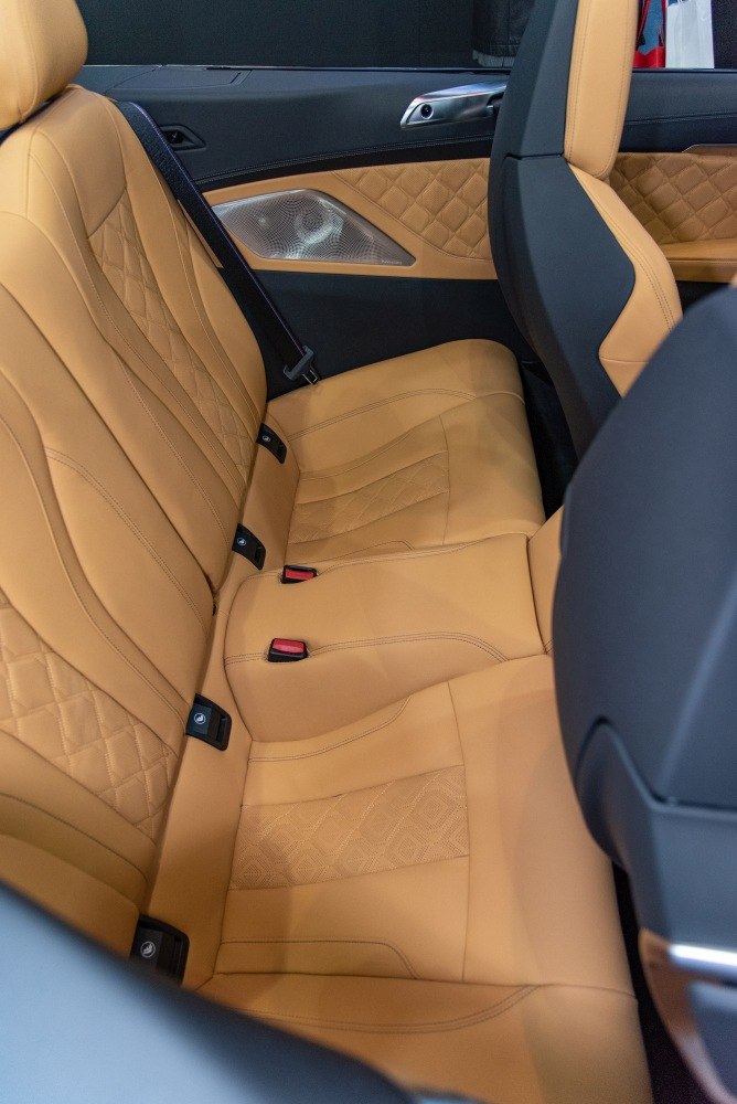 Quilted leather rear seats and detailed door panel with luxurious finishing