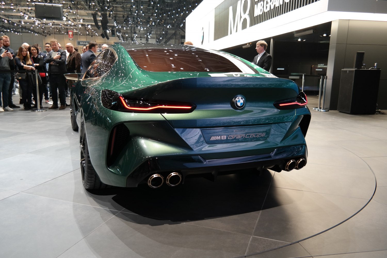 Rear view with sleek LED taillights and quad exhaust pipes