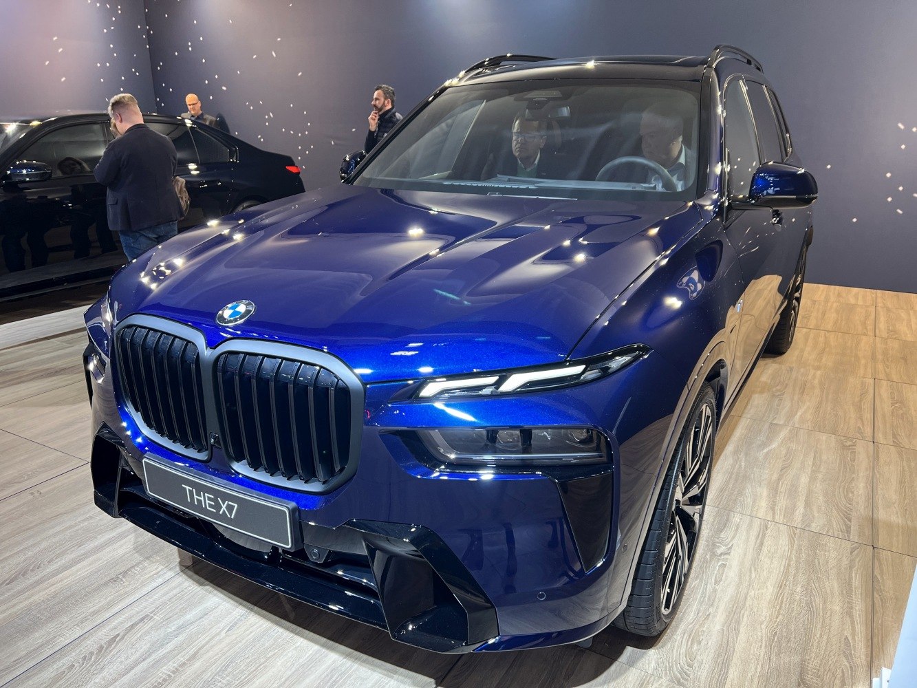 Prominent kidney grille and sleek LED headlights on a luxury SUV front end