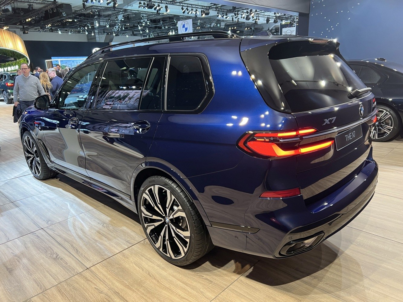 Rear side view featuring LED tail lights and large alloy wheels.