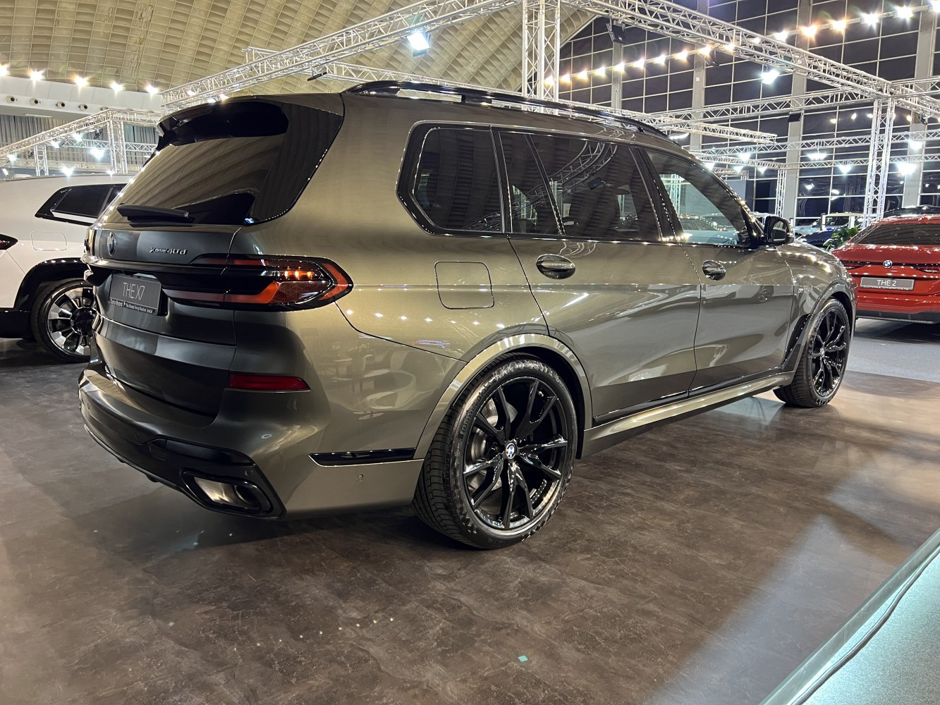Rear and side profile of SUV with black glossy alloy wheels