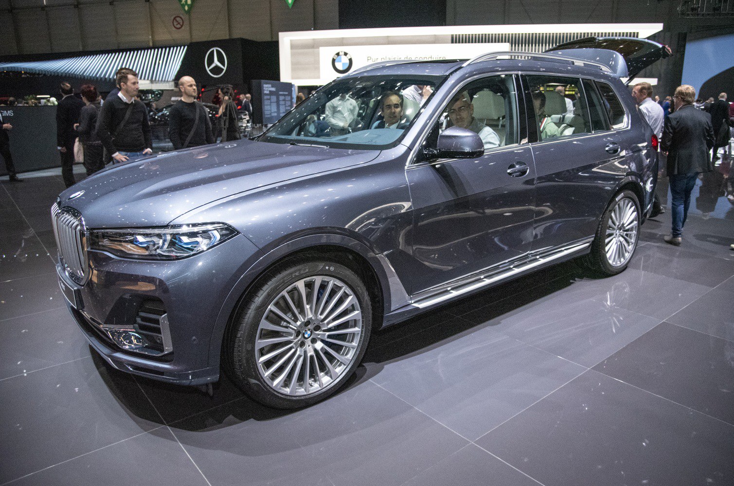 Luxury SUV with prominent kidney grille and multi-spoke alloy wheels