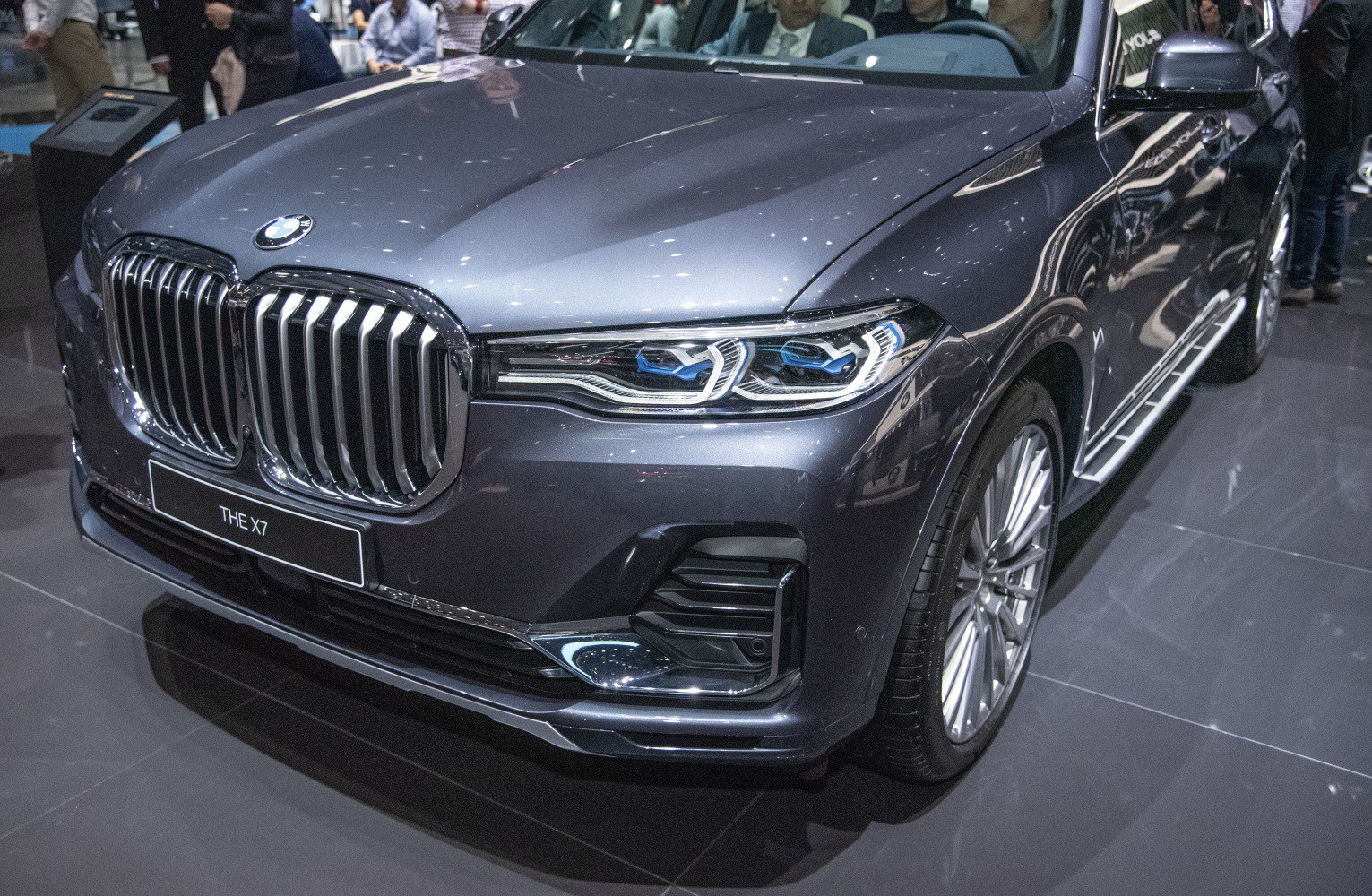 Close-up of BMW X7 kidney grille and LED headlight design