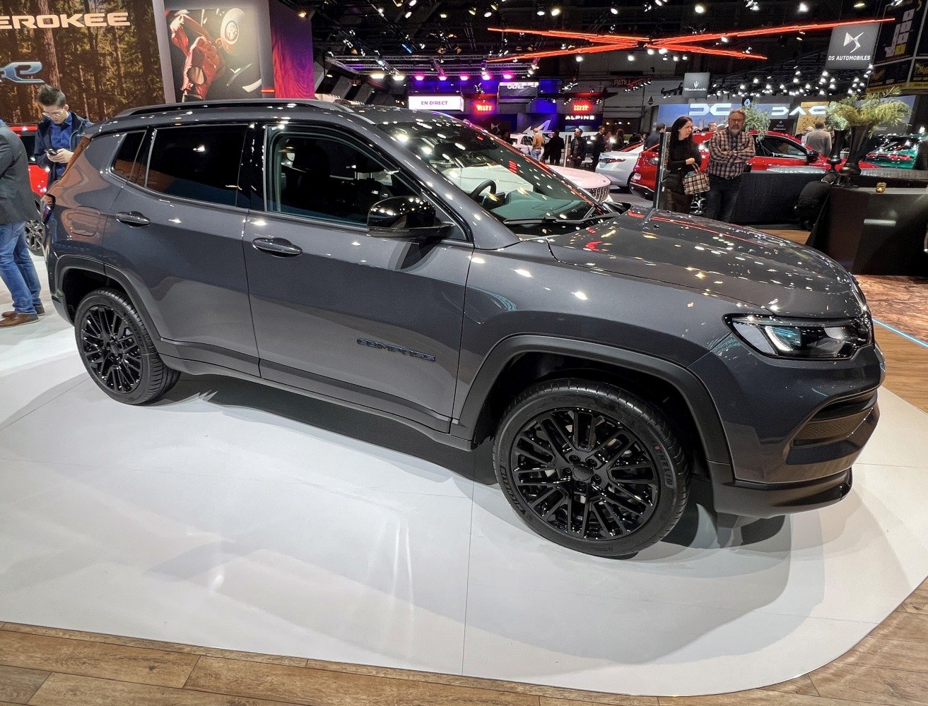 Side profile with black alloy wheels and tinted windows