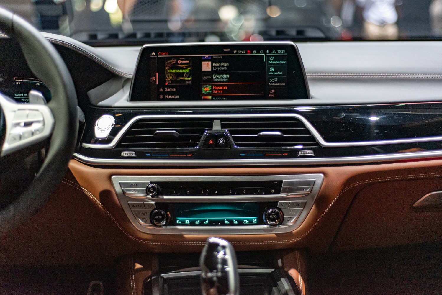 Luxury SUV dashboard with infotainment and climate controls