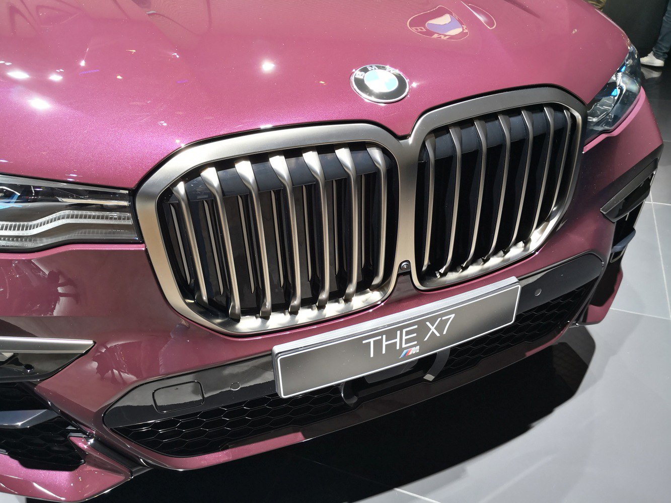 BMW-style kidney grille and LED headlight close-up on SUV front