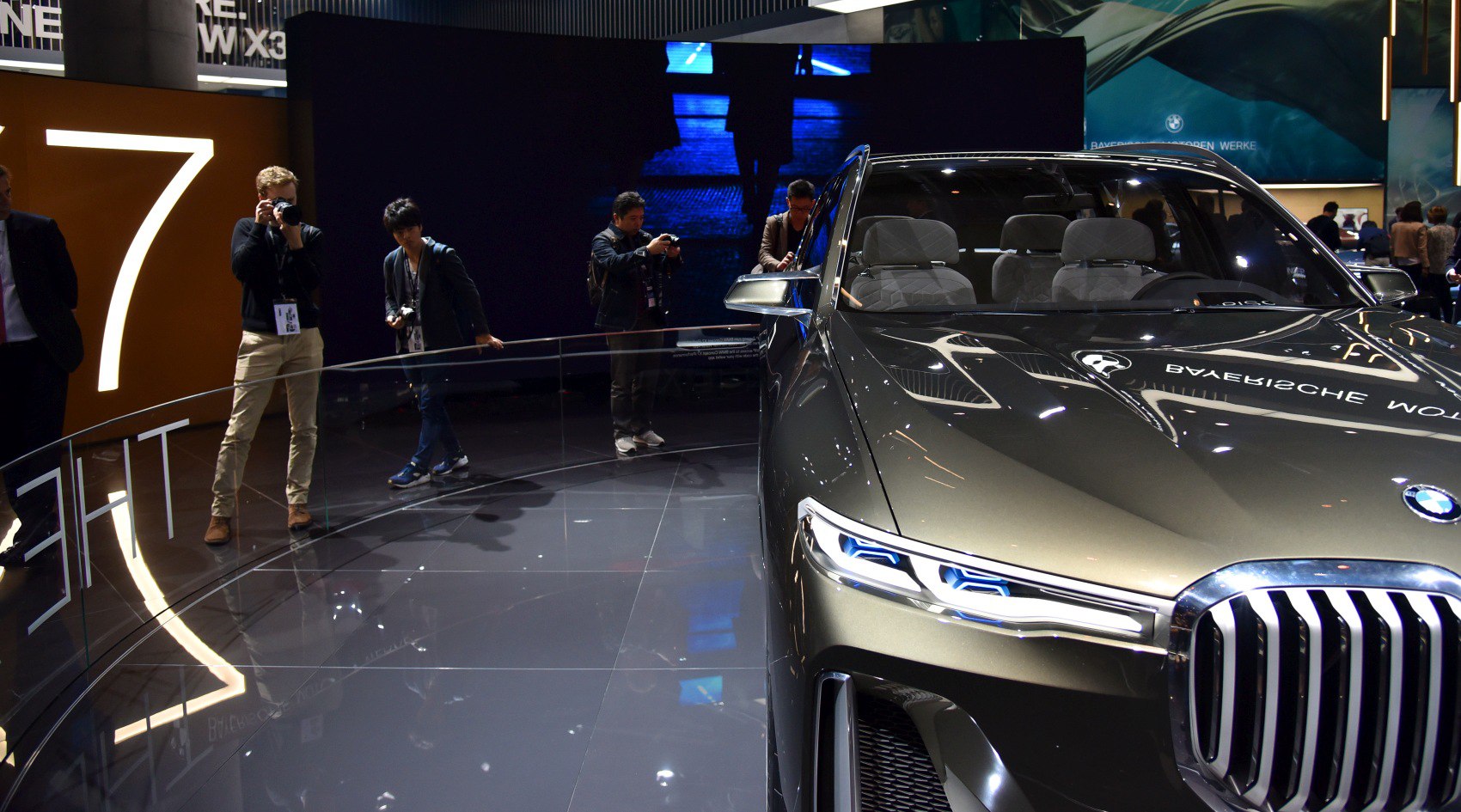 Front view with dual LED headlights and large kidney grille