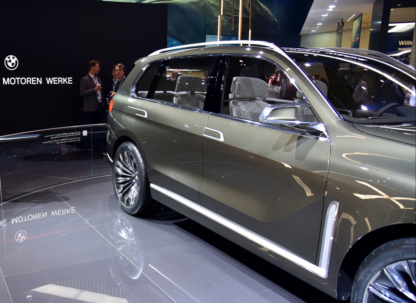 Side profile with chrome trim and luxury interior of SUV