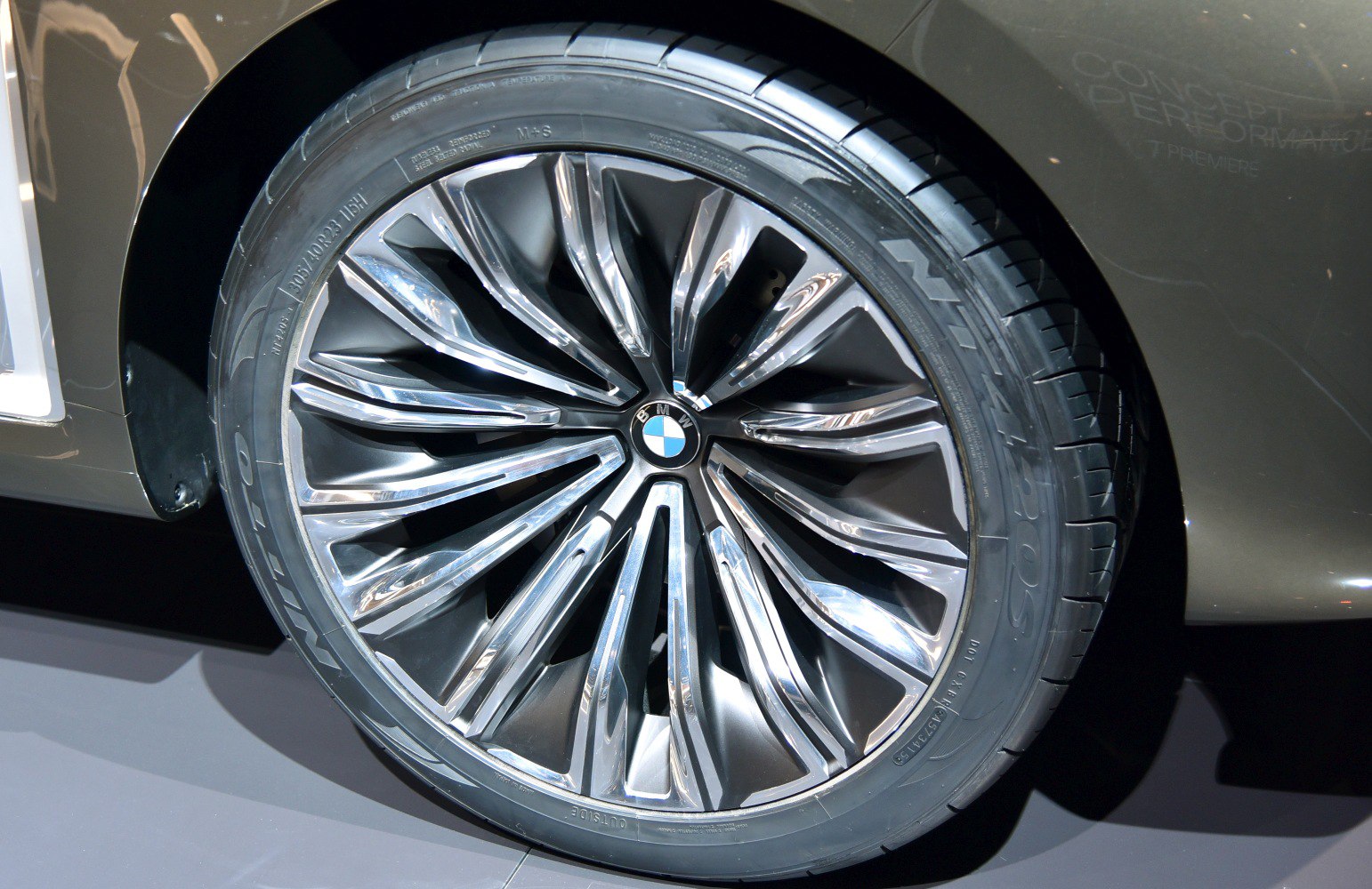Close-up of a multi-spoke alloy wheel with premium tire
