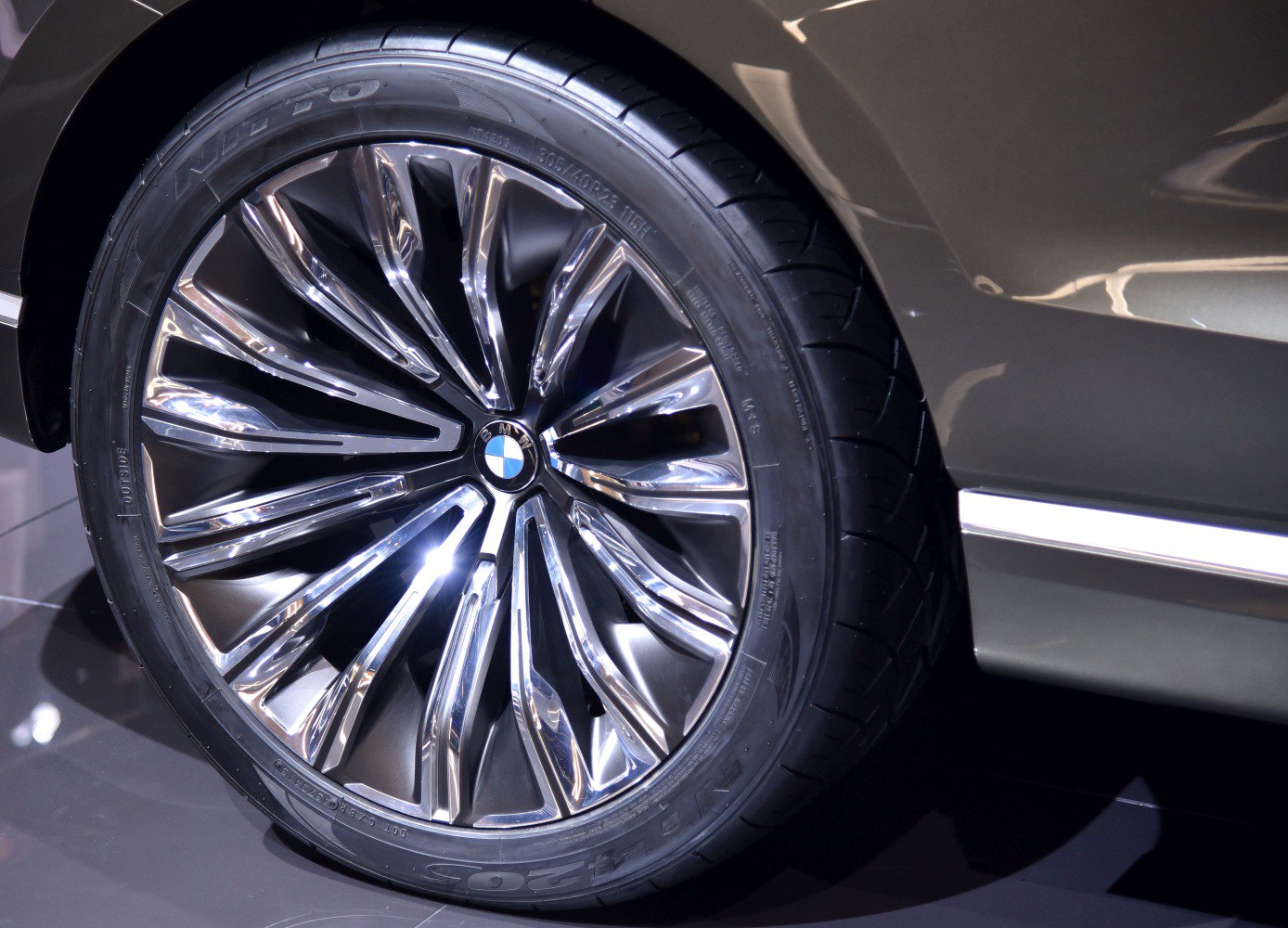 Chrome alloy wheel with multi-spoke design and low-profile tire