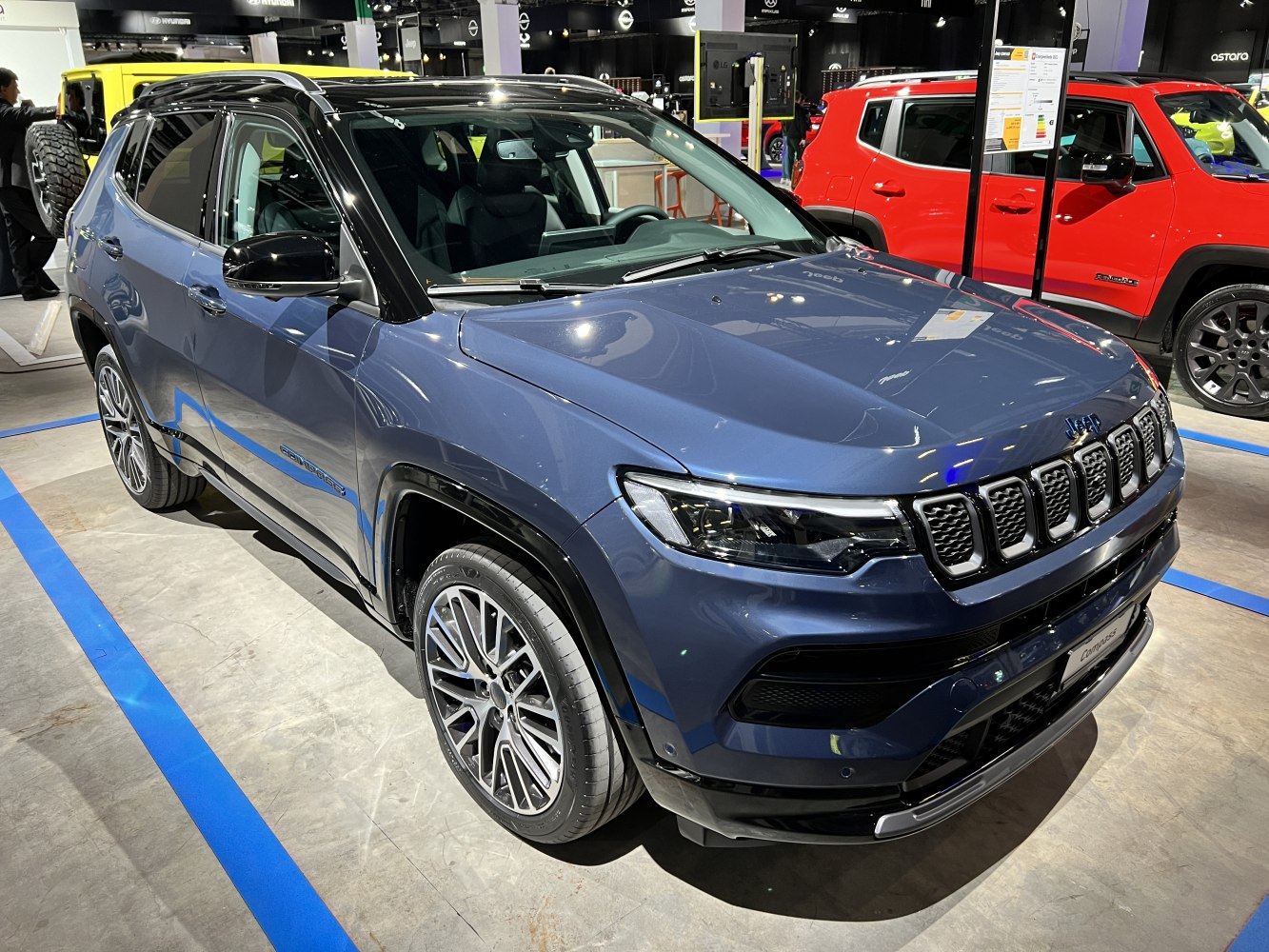 Front and side view of modern SUV with distinctive grille and sleek headlights