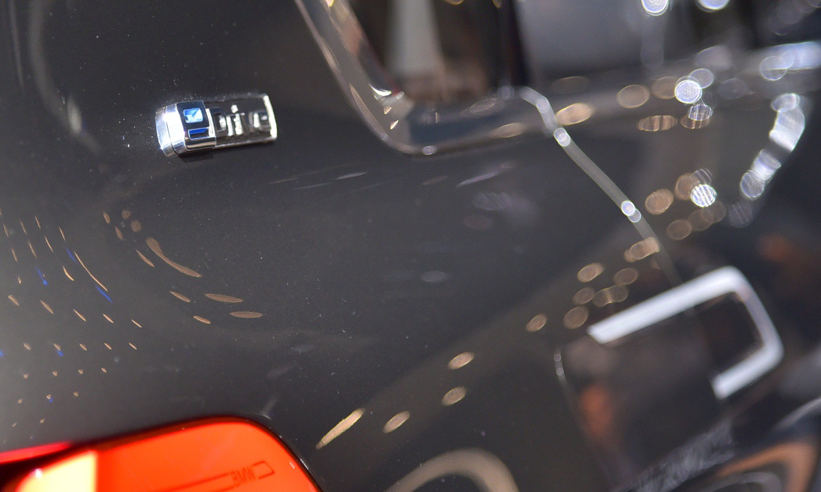 Close-up of BMW X7 Concept M50d rear badge and tail light