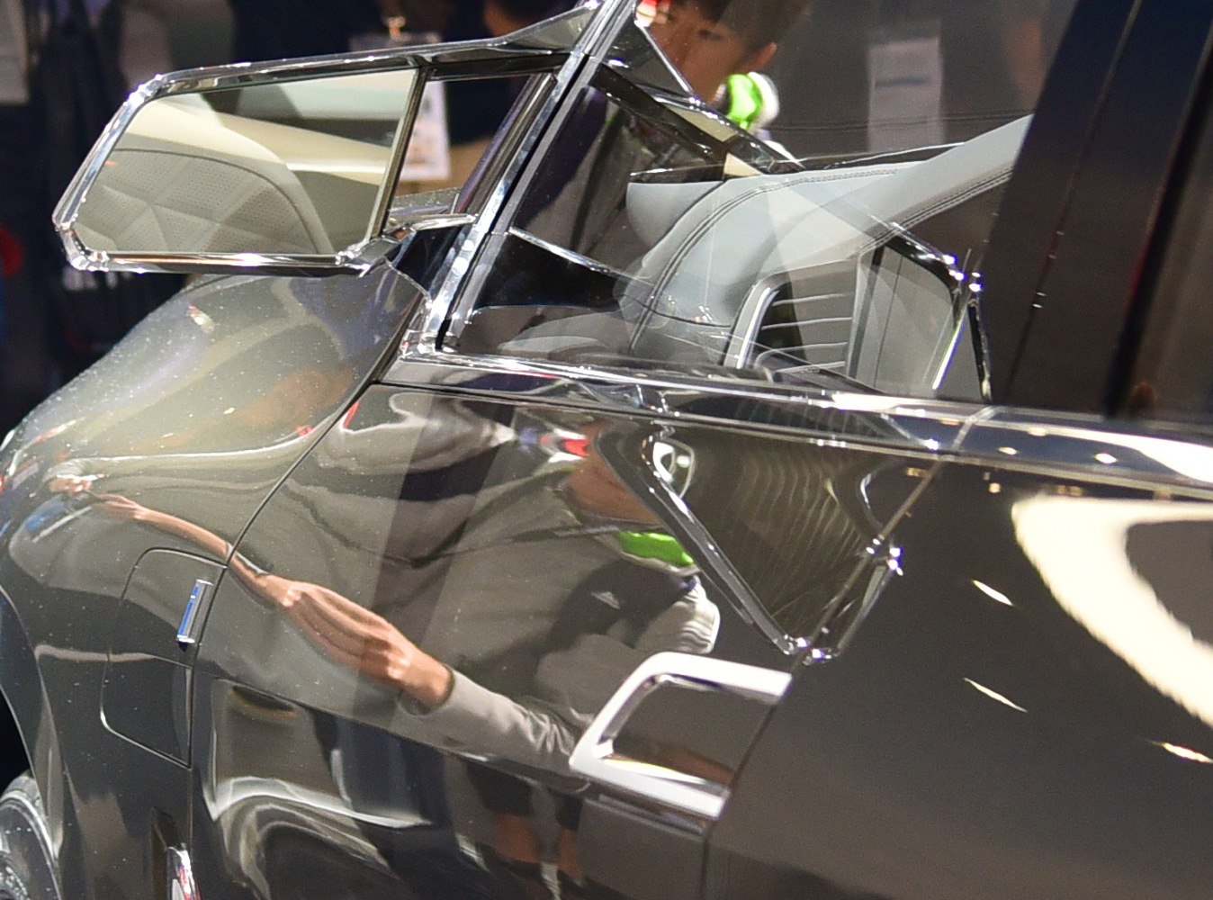 Angular door mirror and window design with reflective surface