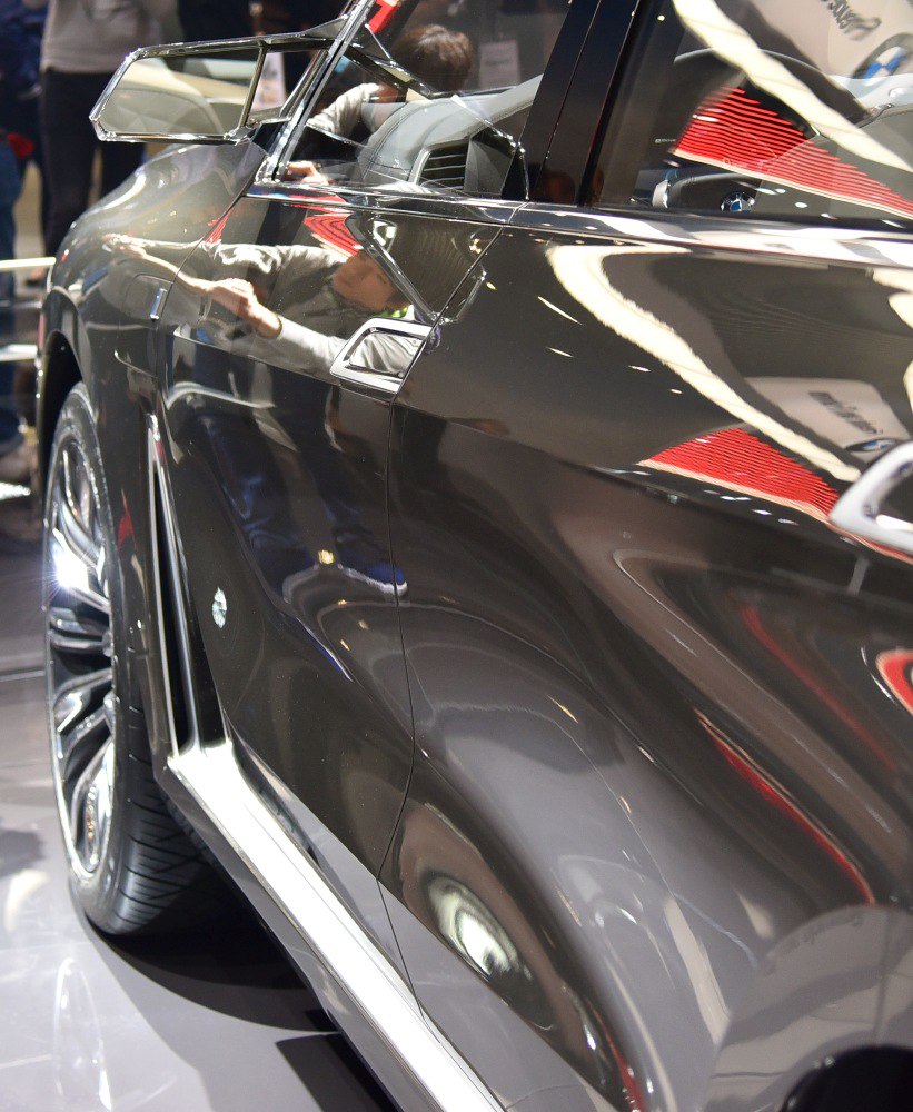 Close-up of side door and mirror with glossy finish
