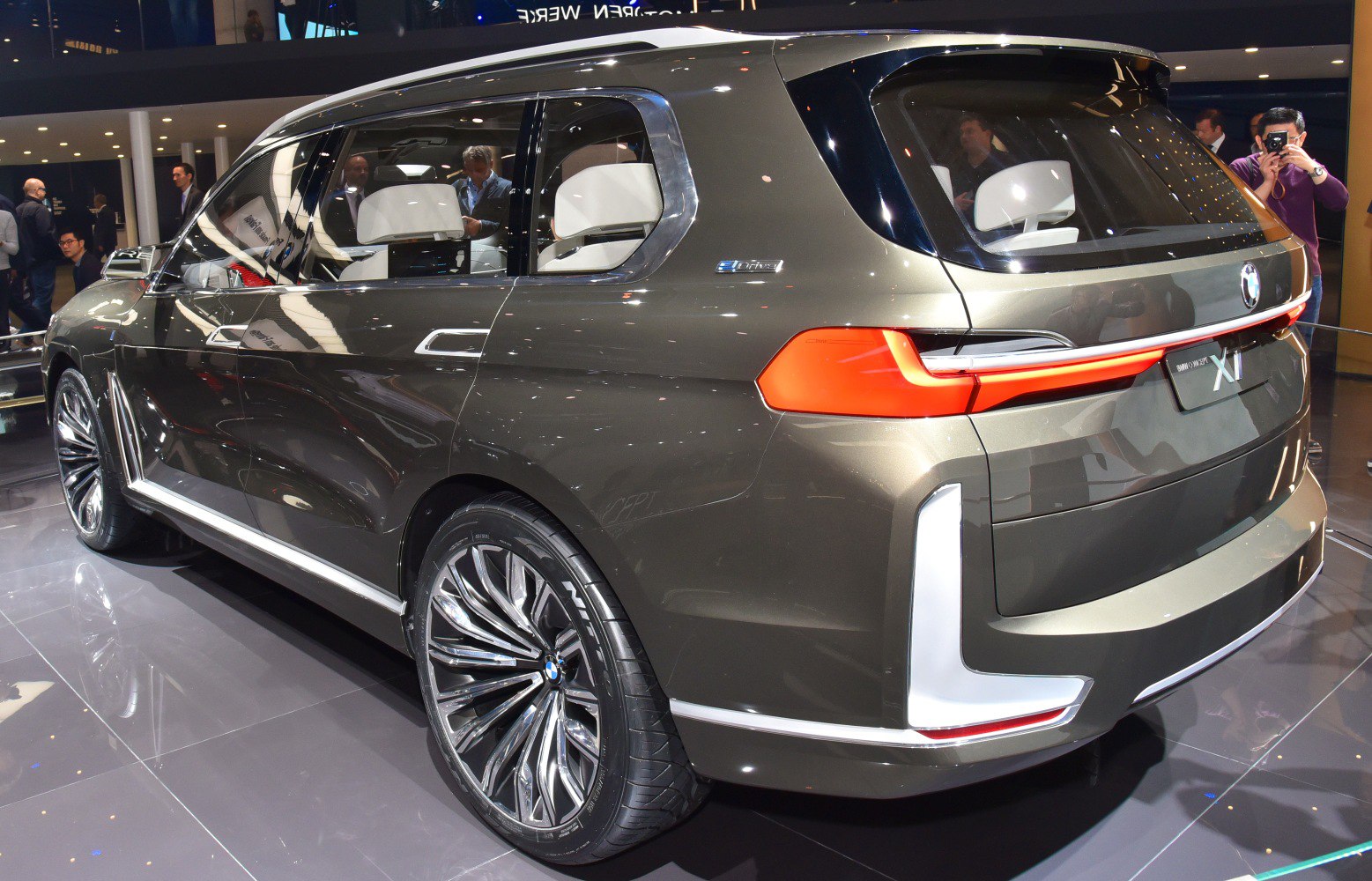Sleek rear and side view with futuristic LED lights and large alloy wheels