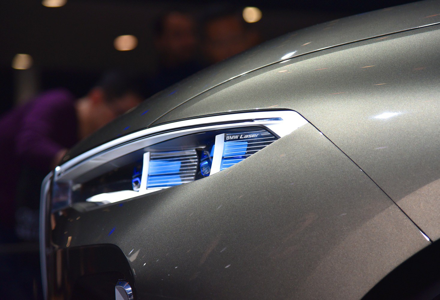 Close-up of BMW laser headlight and front fender design
