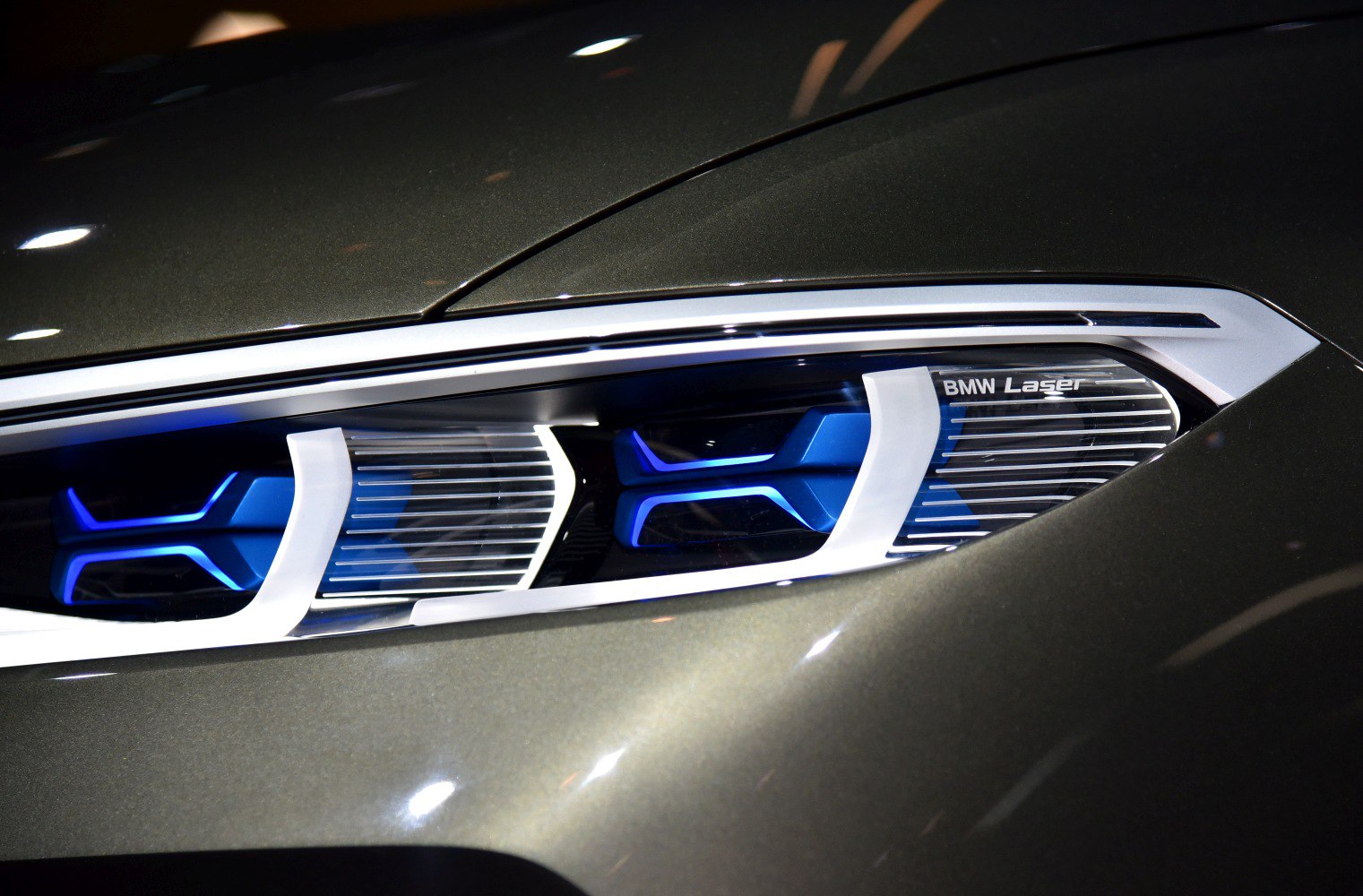 Close-up of futuristic laser headlight with distinct blue accents
