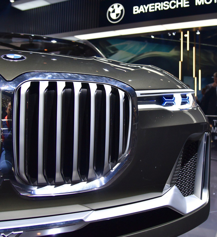 Bold kidney grille and futuristic headlight design.