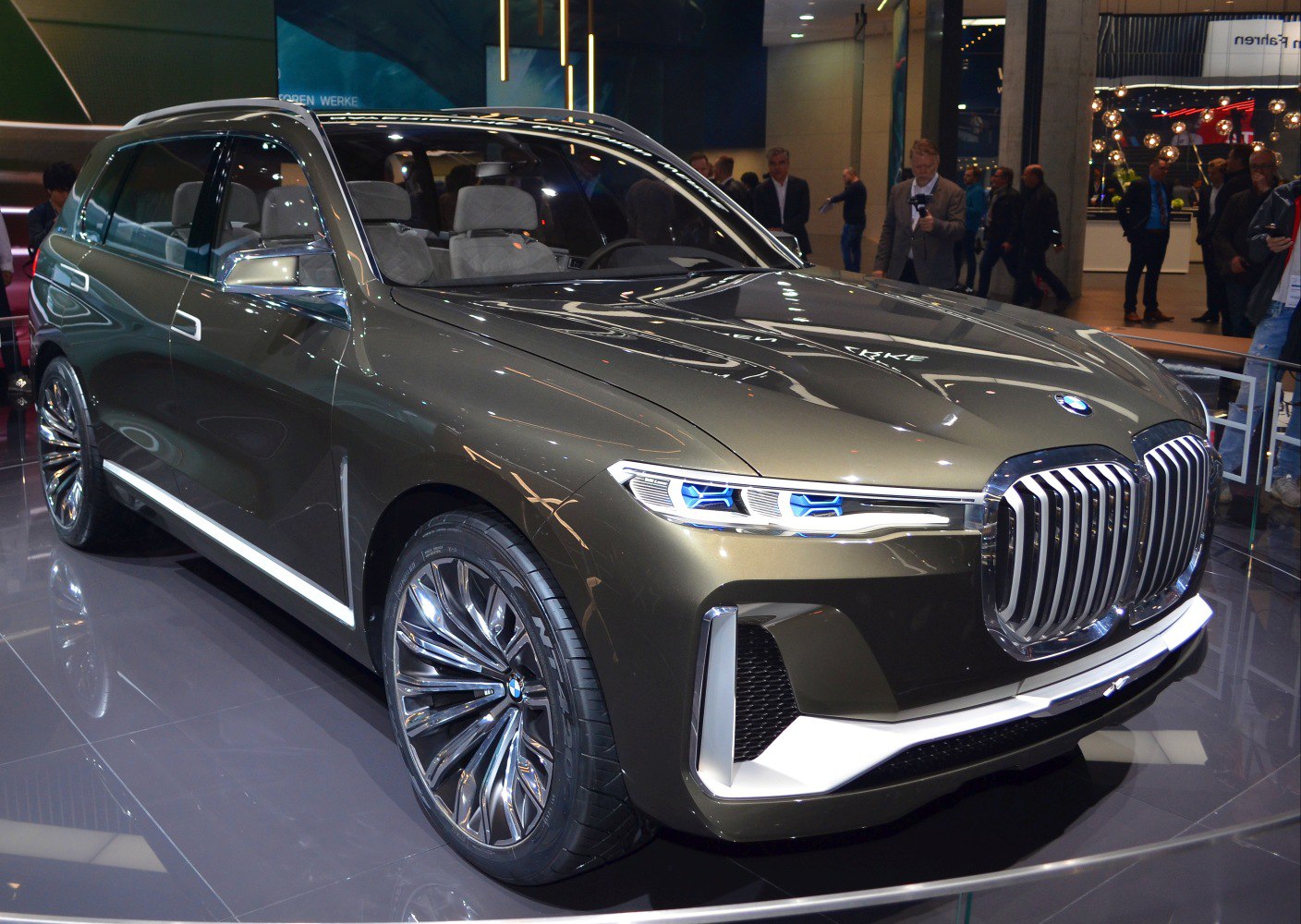 Luxury SUV with prominent kidney grille and sleek LED headlights