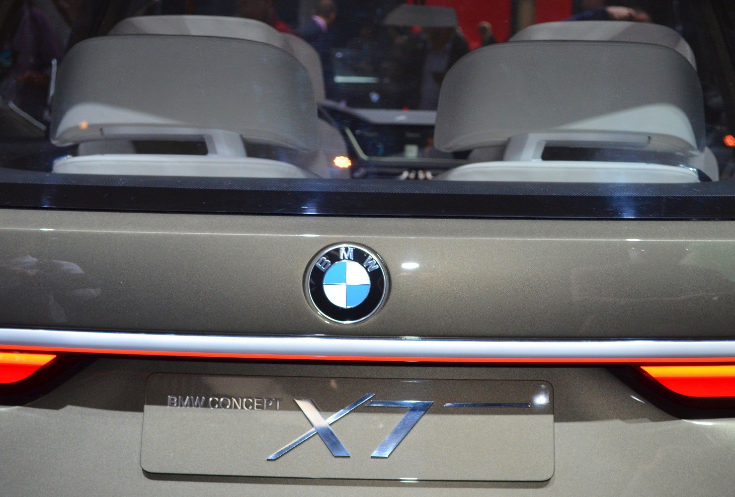 Rear close-up of BMW X7 Concept badge and illuminated tail lights