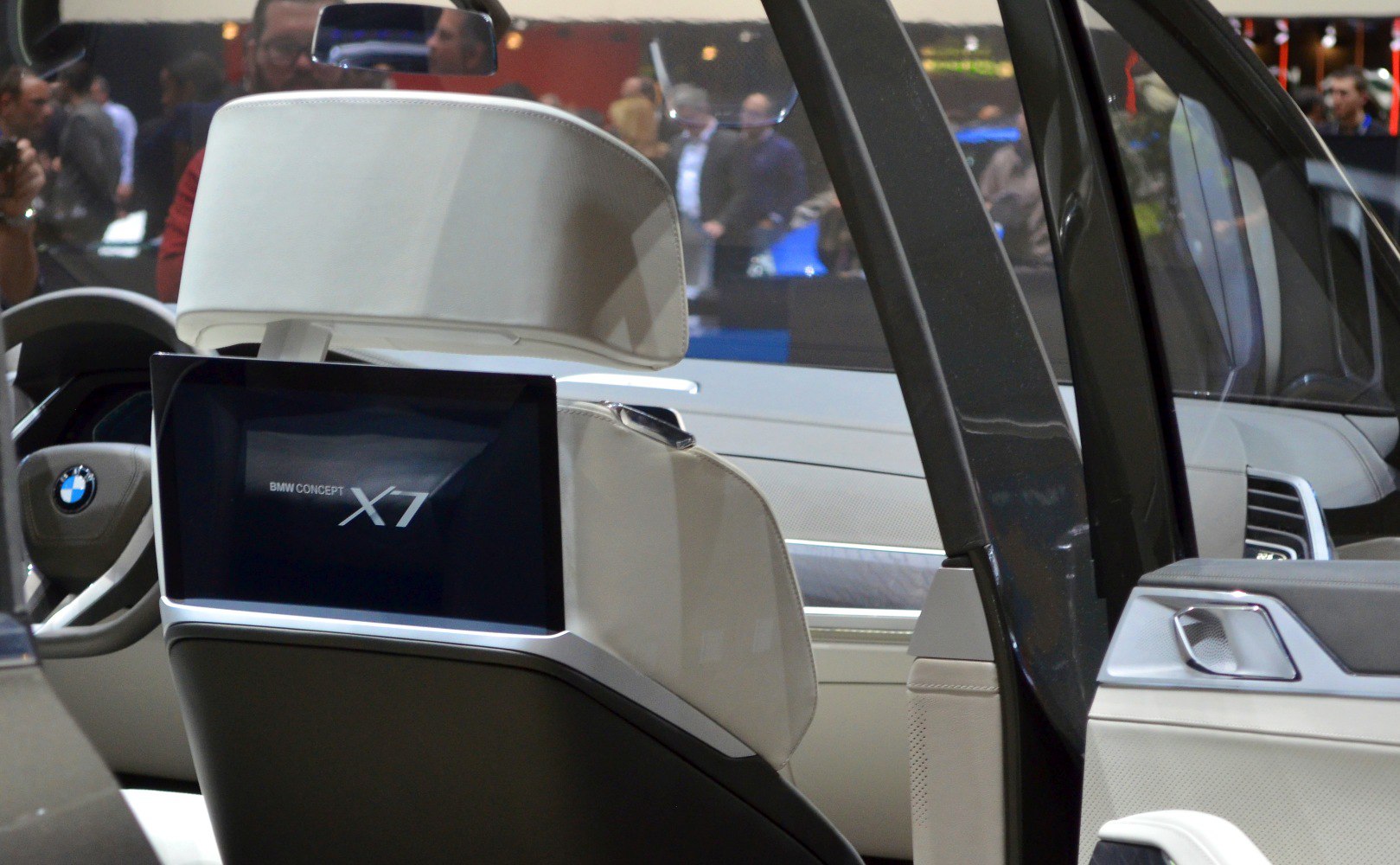 Luxury rear seat display screen and premium interior design.