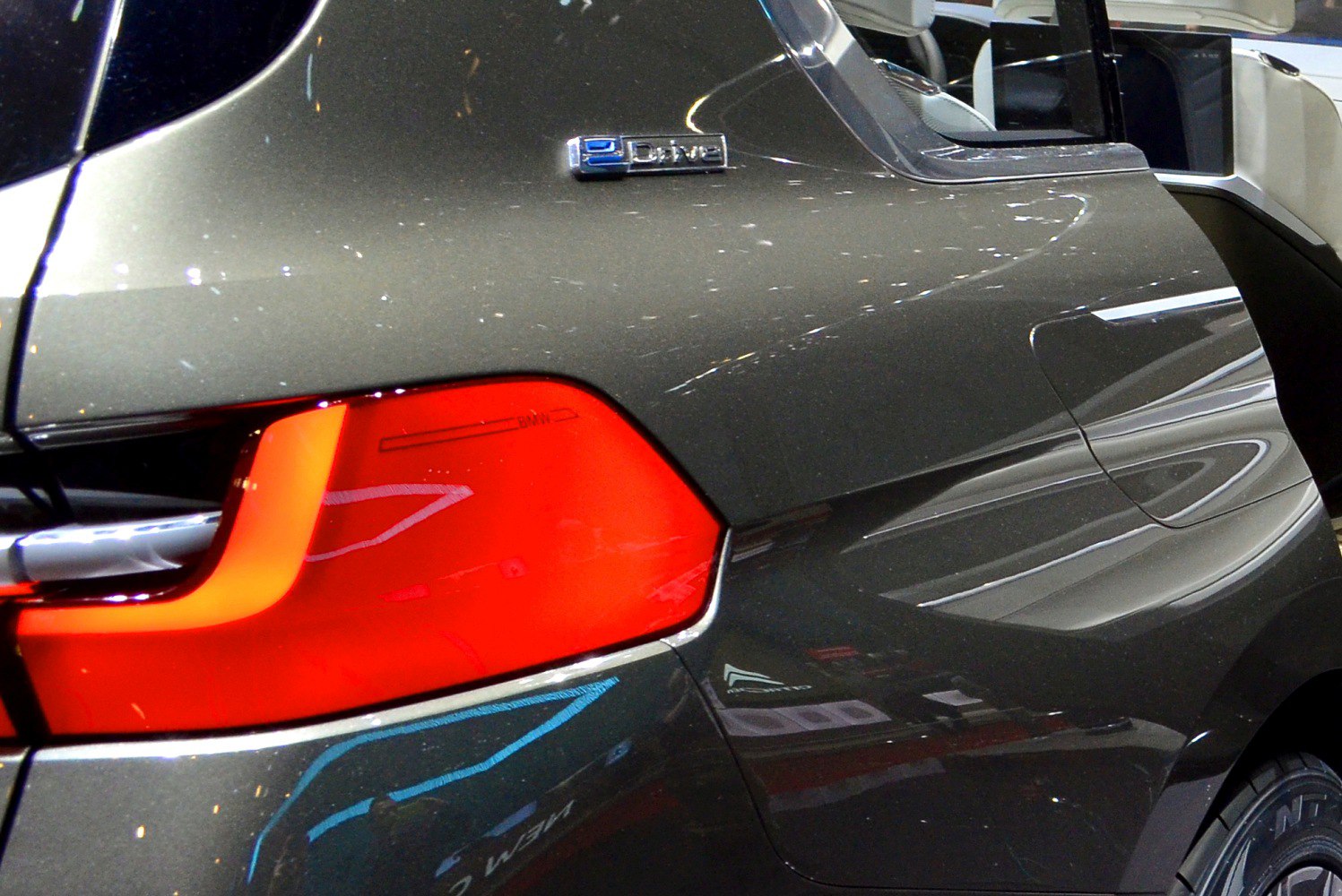 Rear side with eDrive badge and red tail light