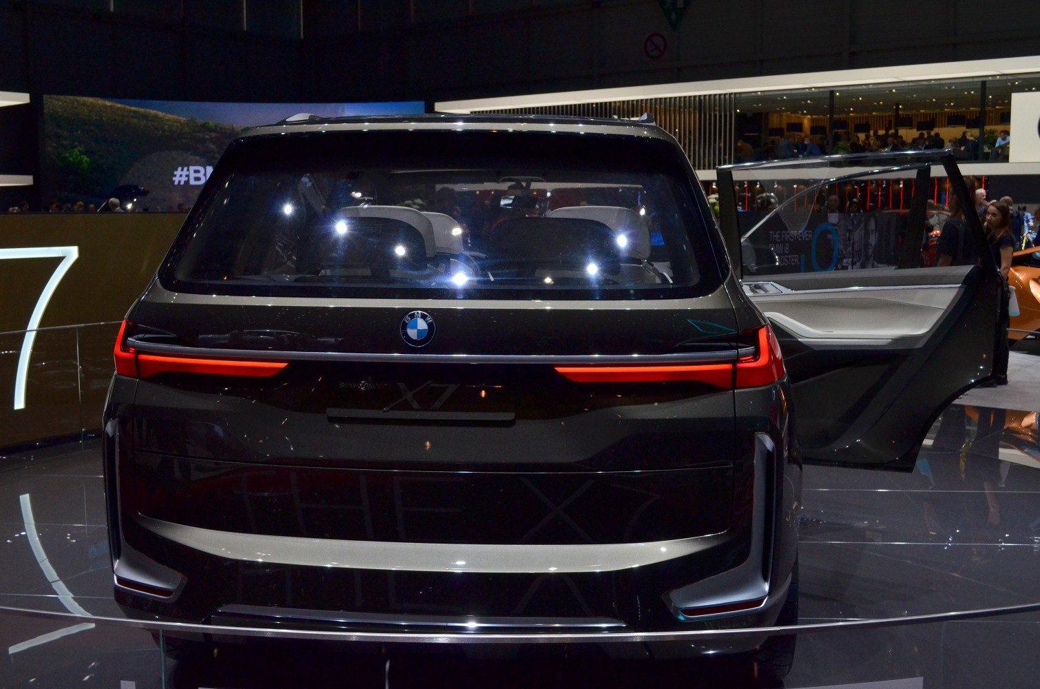 Rear view with LED tail lights and open rear right door