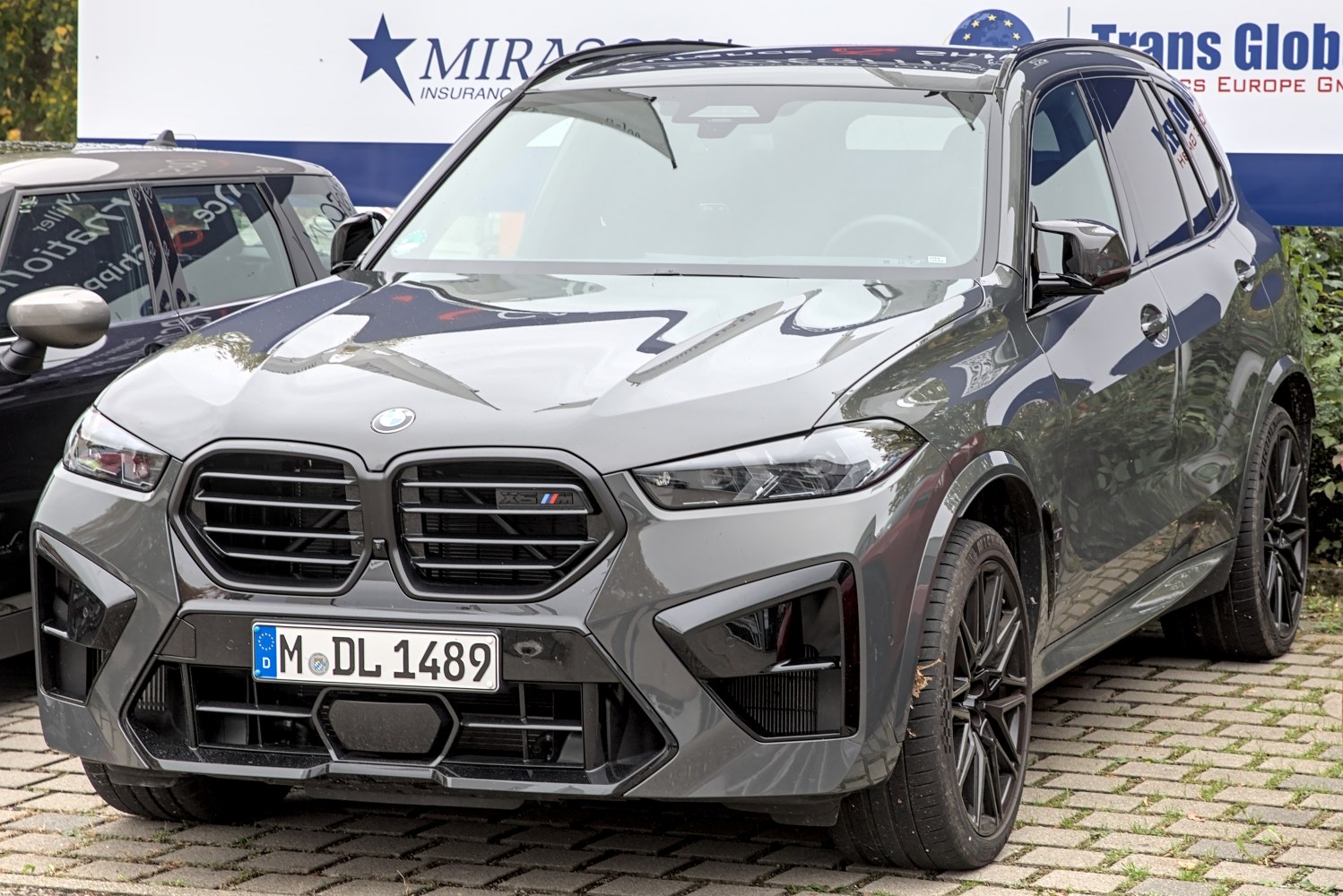BMW X5 M facelift front grille and LED headlights.