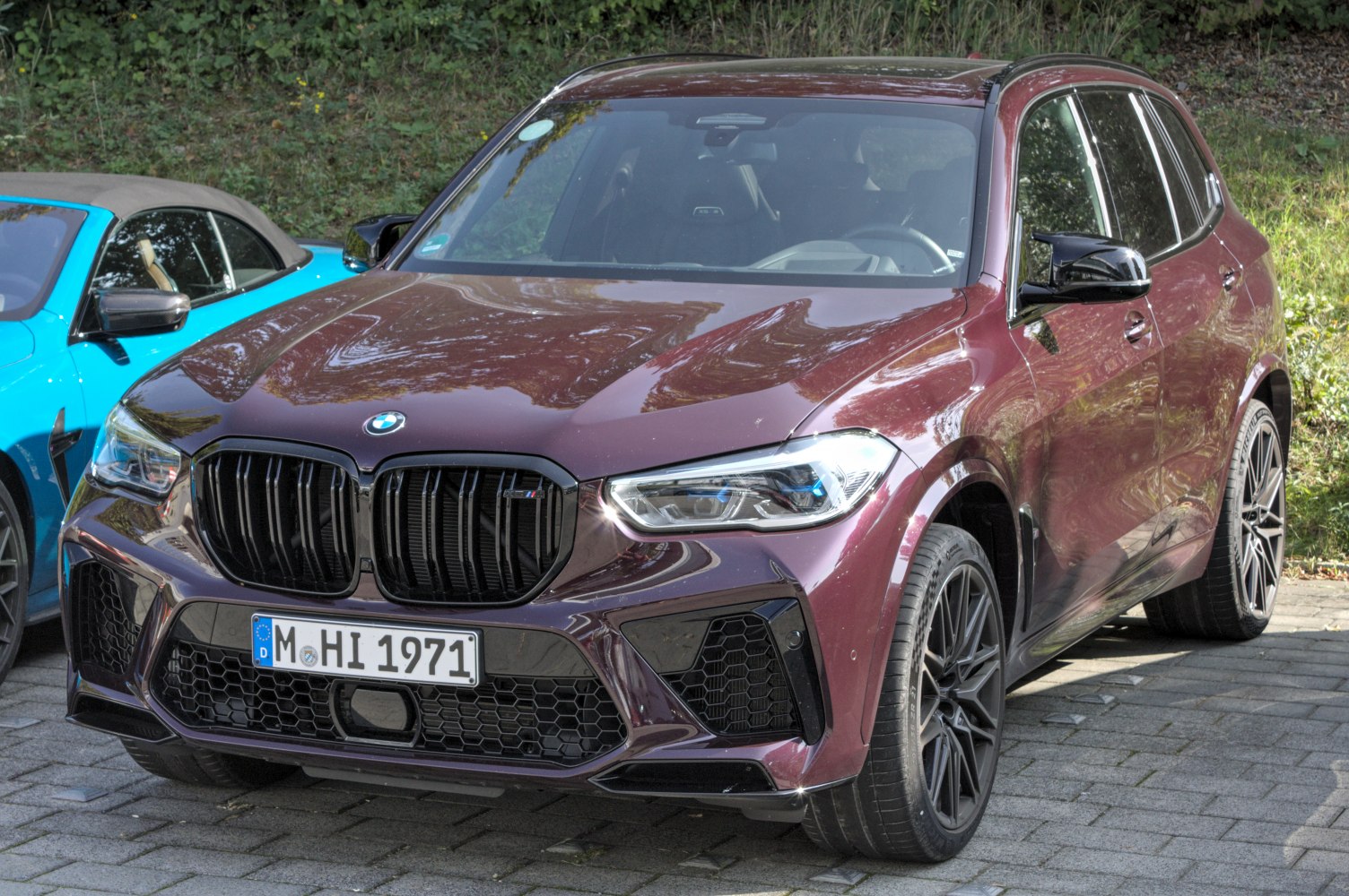 Aggressive front view with bold kidney grille and sporty LED headlights