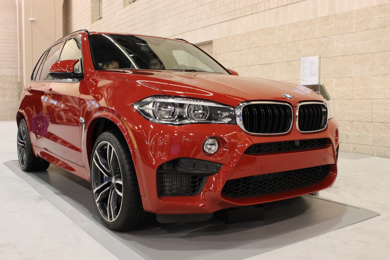 Aggressive front-end SUV with kidney grille and sports alloy wheels