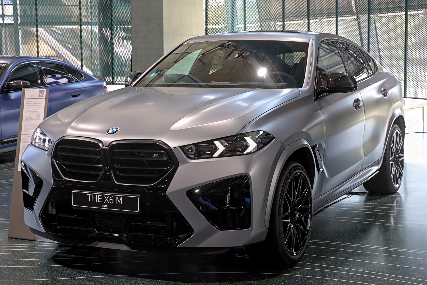 Front view with black grille and LED headlights