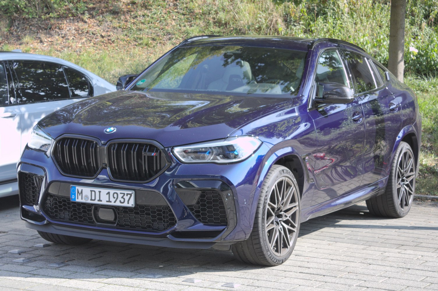 Front view with kidney grille and LED headlights.