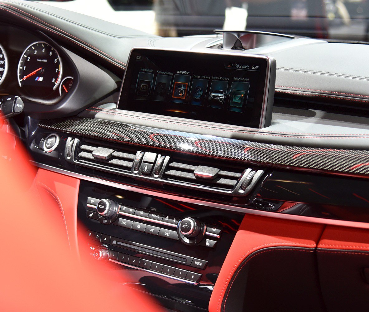 Dashboard with carbon fiber trim and advanced infotainment system