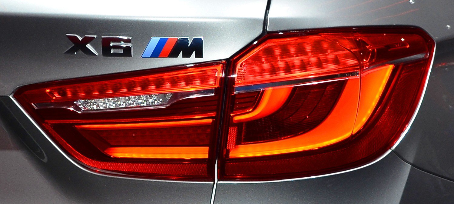 Close-up of BMW X6 M F86 taillight and badge