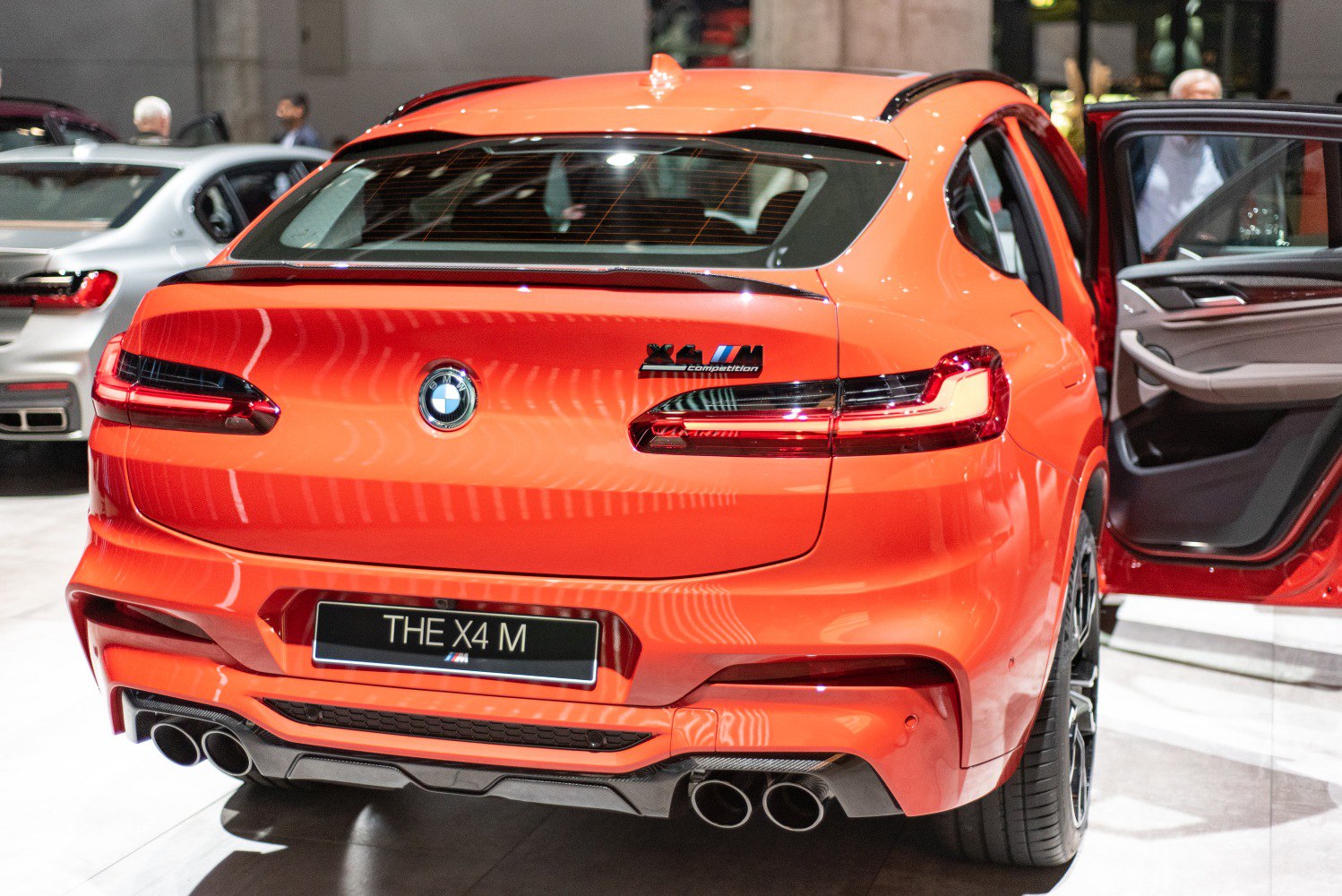 Rear view with quad exhaust and sleek taillights