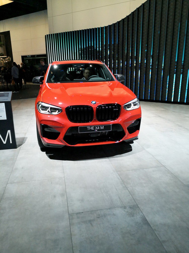 Aggressive kidney grille and LED headlights, front view of sporty SUV