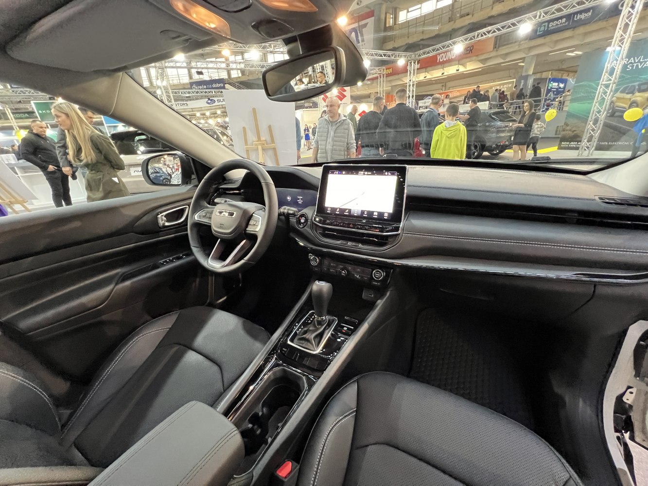 Interior with touchscreen infotainment and steer wheel
