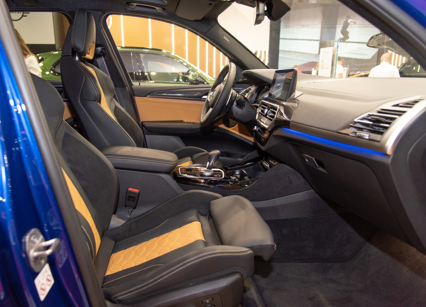 Sporty leather seats with honeycomb pattern and modern dashboard interior