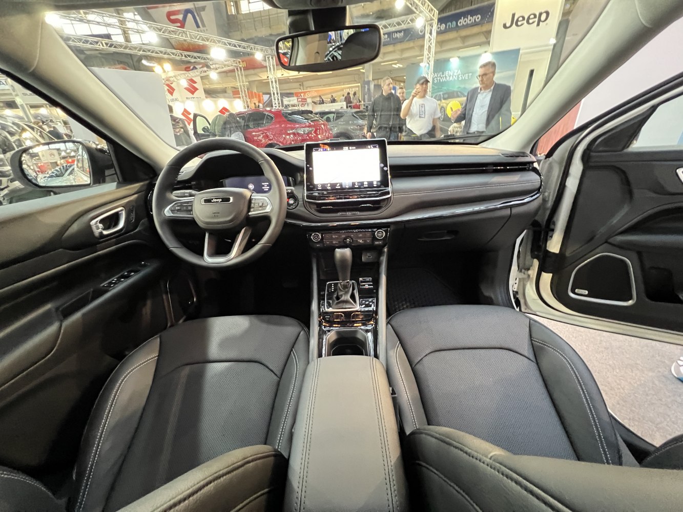Modern SUV interior with touchscreen and sleek dashboard