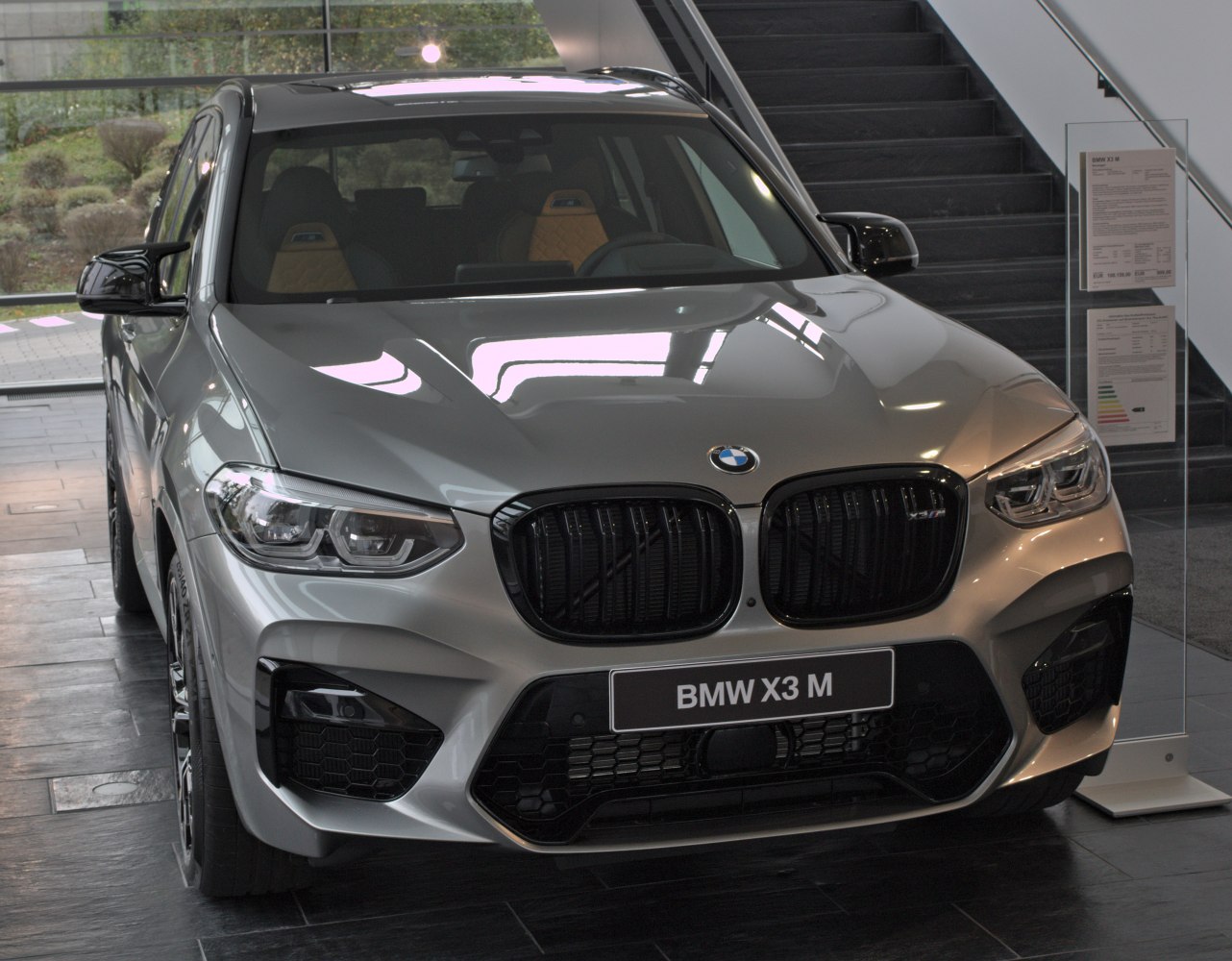 Aggressive front grille and sharp LED headlights with sporty design