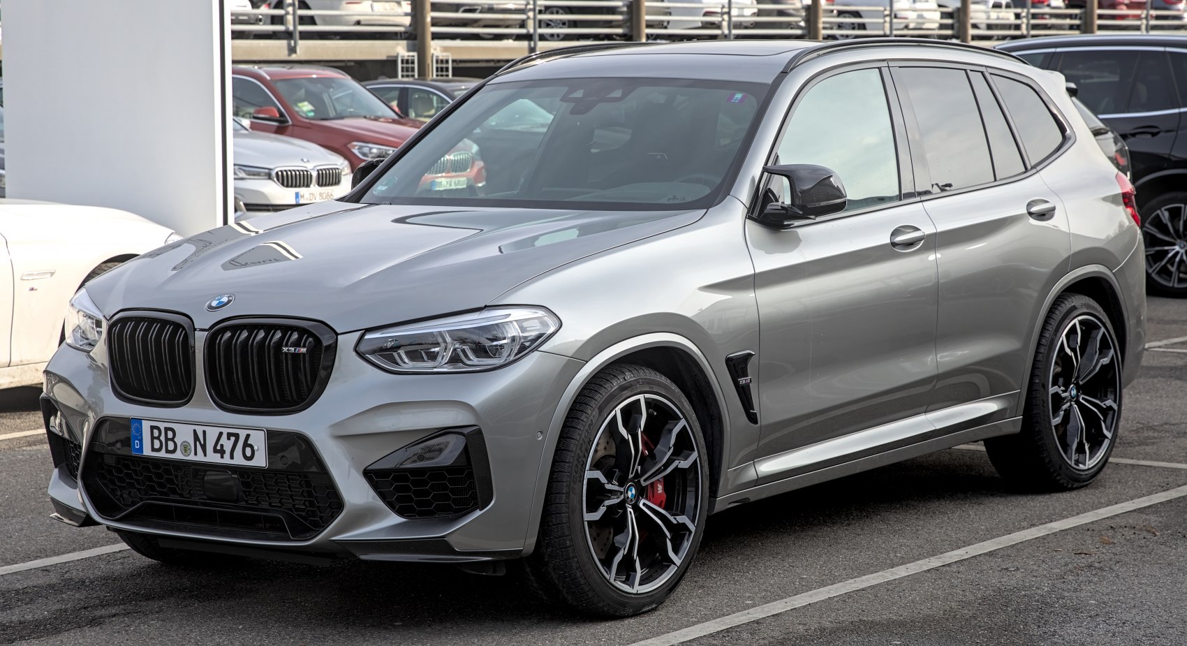 Silver SUV with sporty grille, LED headlights, and distinctive alloy wheels