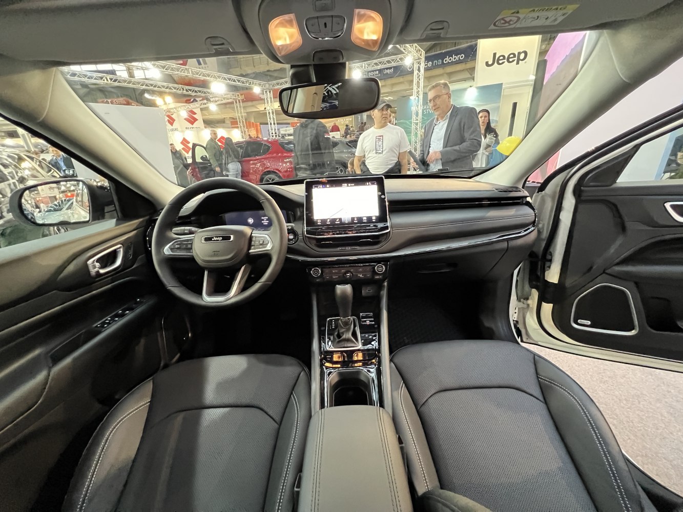 Modern SUV interior with digital dashboard and touchscreen display