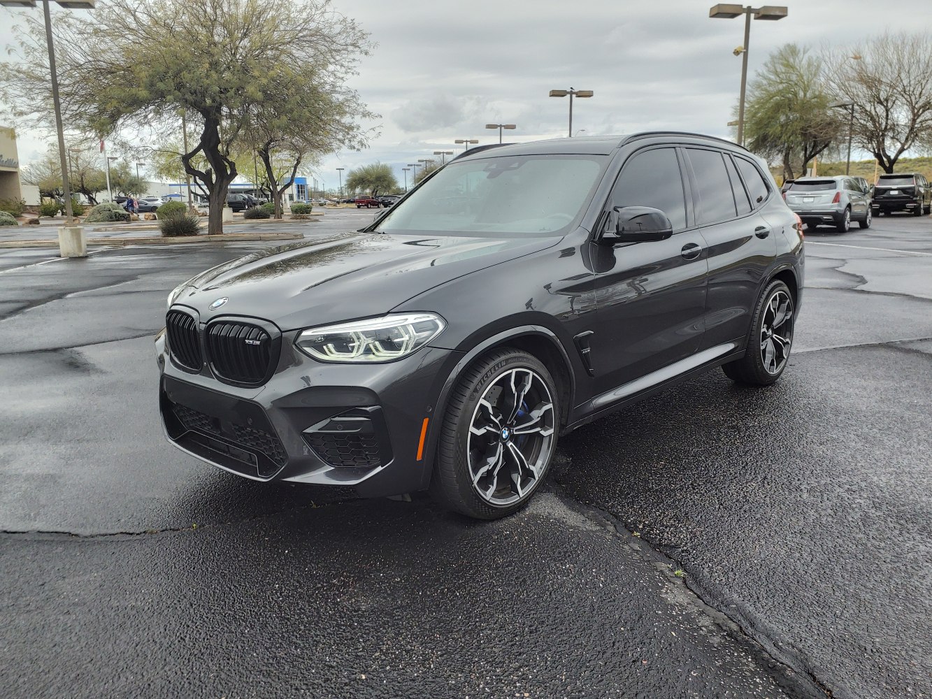 Front side view with LED headlights and sporty multi-spoke wheels