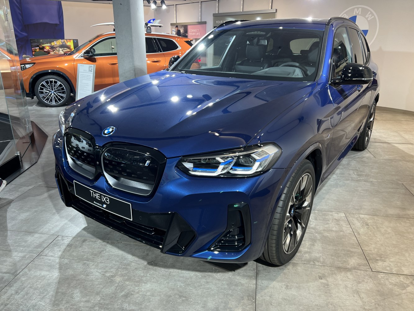 Front exterior with LED headlights and kidney grille of electric SUV