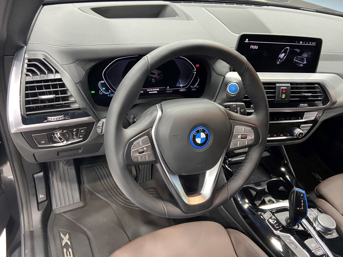 Electric SUV interior with digital dashboard and multifunction steering wheel
