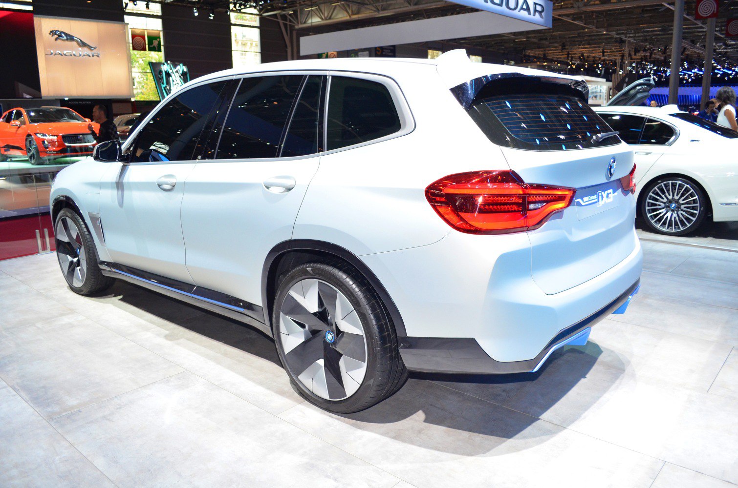 Rear side view and futuristic aerodynamic wheels of an SUV