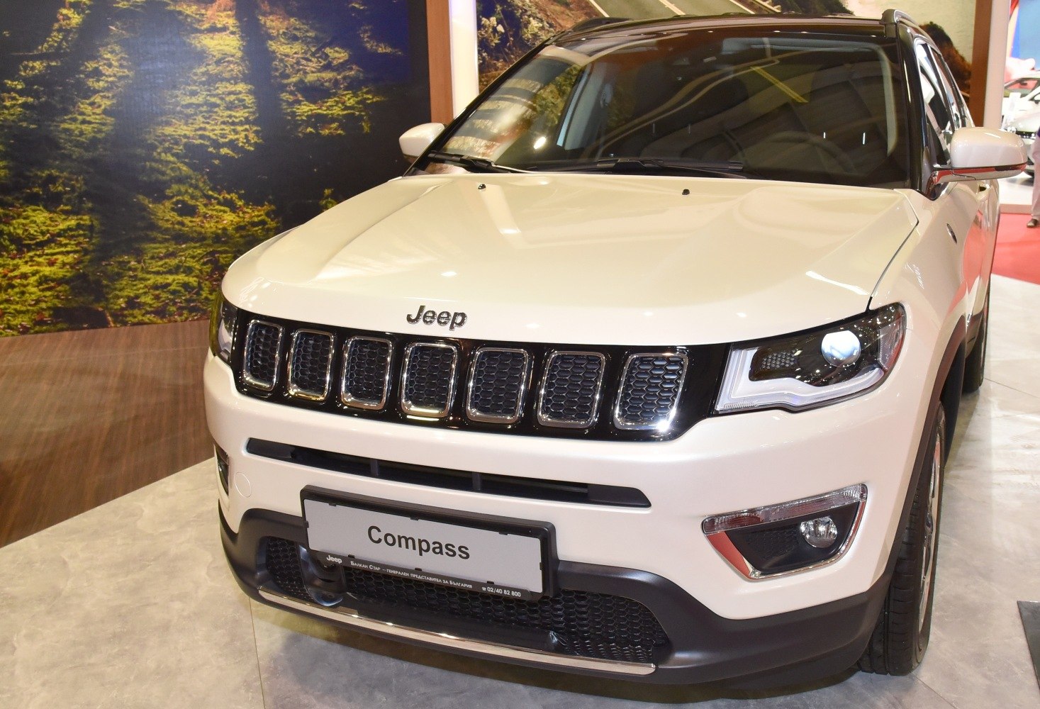 Seven-slot front grille with modern headlight design on SUV